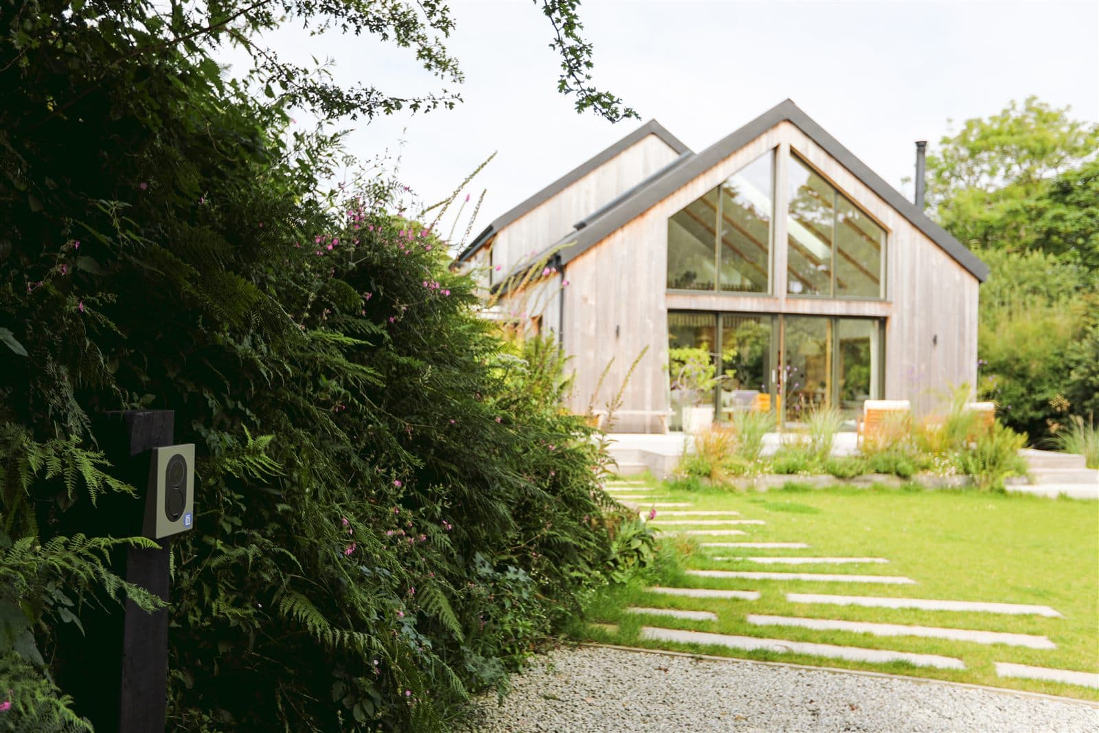 Charger installed beside a modern Cornish holiday home